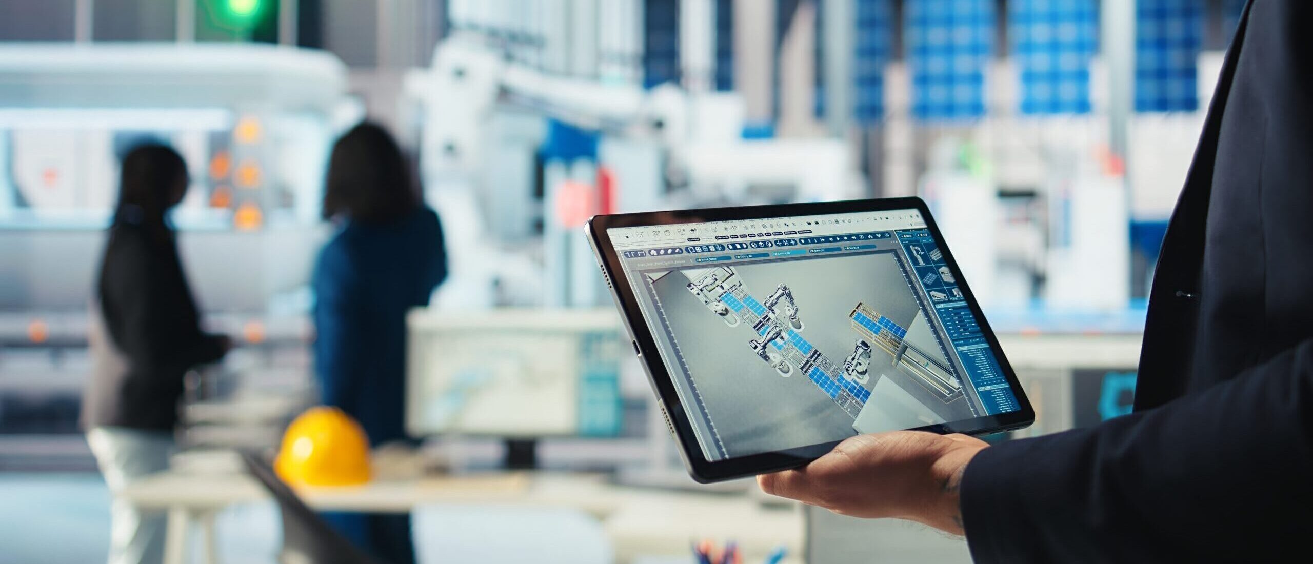 Engineer in photovoltaics factory uses tracking software on tablet to review performance of robot arms manufacturing solar panels. Expert uses device to inspect solar plant machinery, camera A closeup